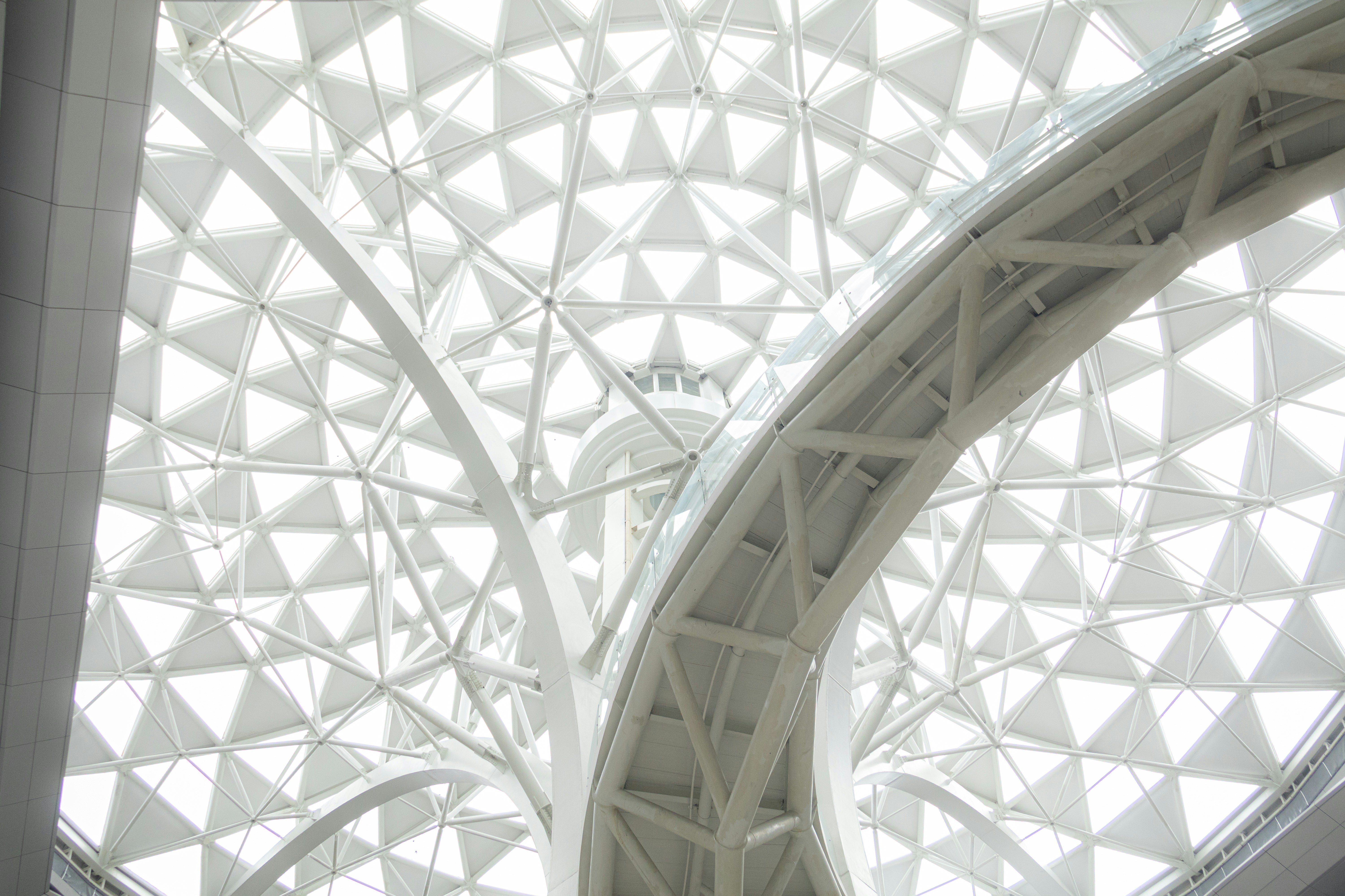 Modern geometric ceiling with white triangular panels