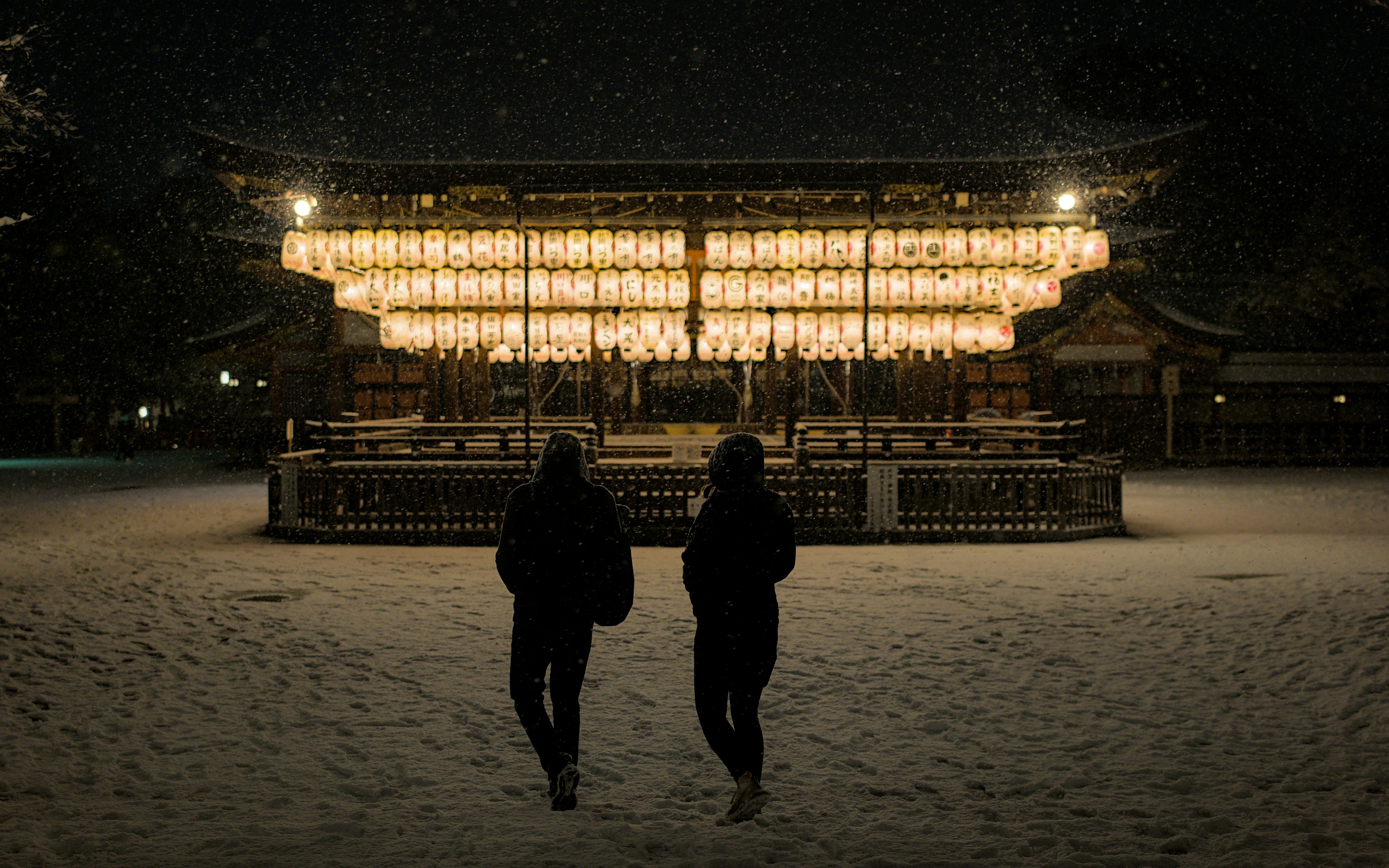 Japanese winter temple illuminated at night