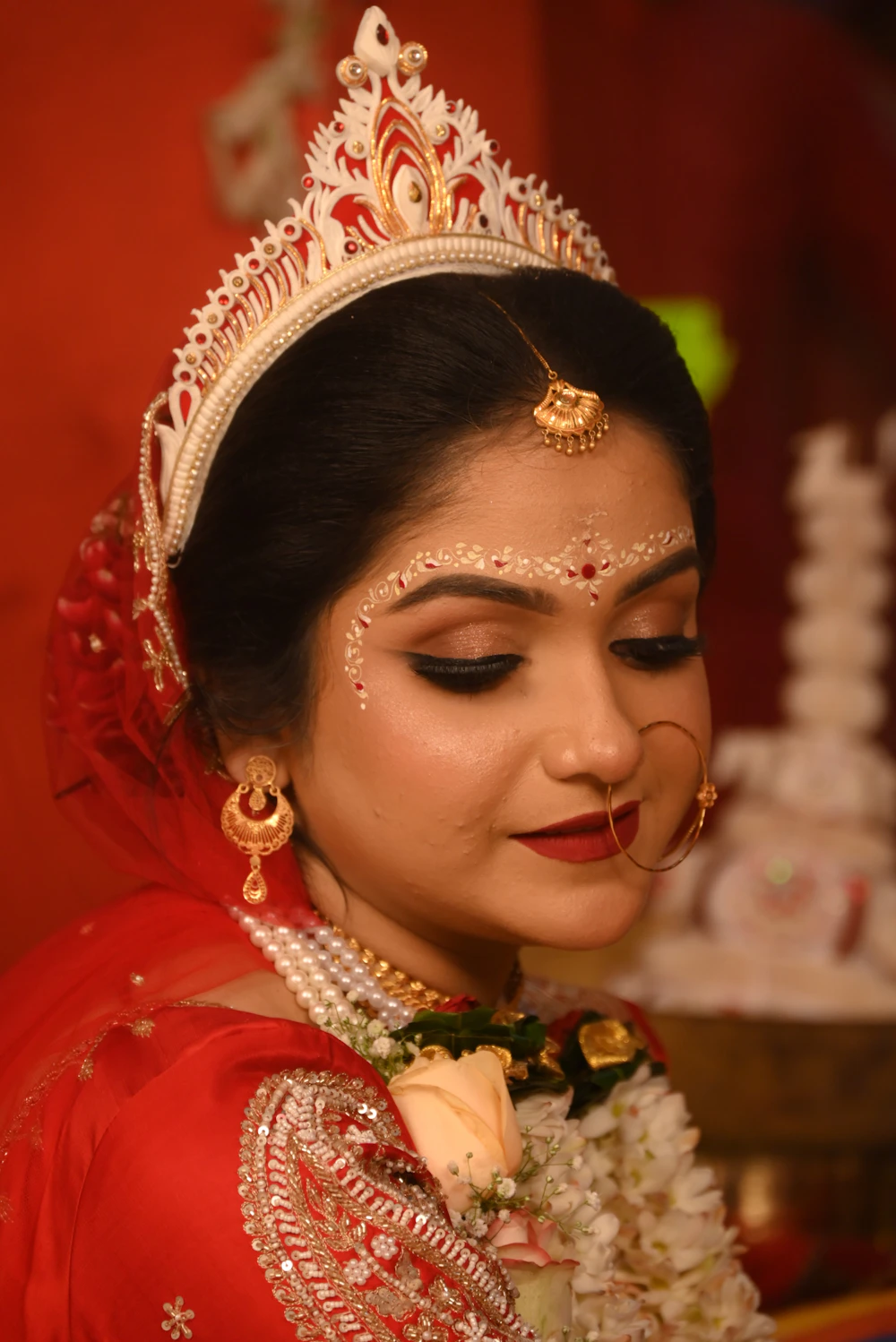 Makeup artist applying makeup reference