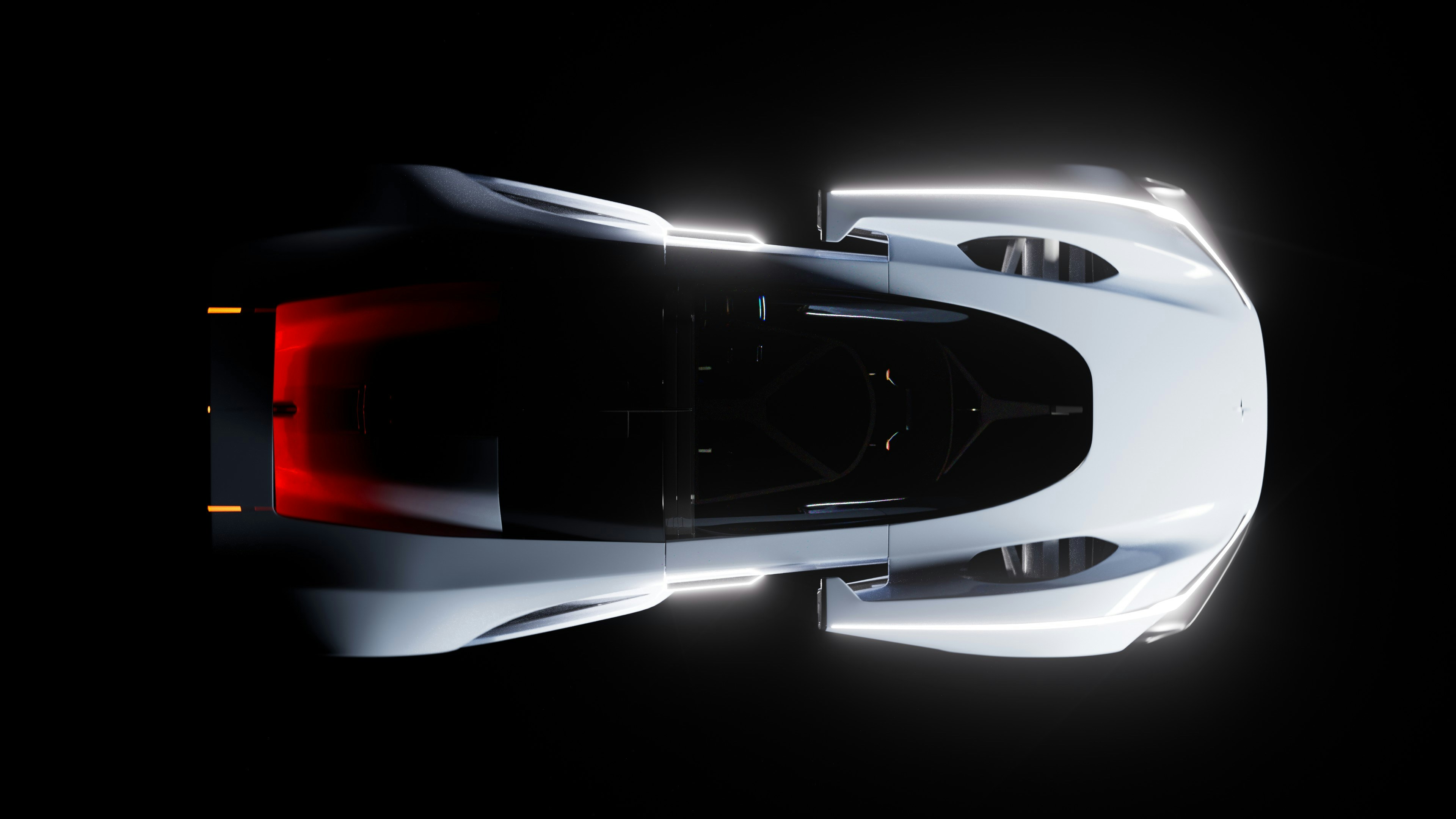 A futuristic white sports car with glowing red taillights