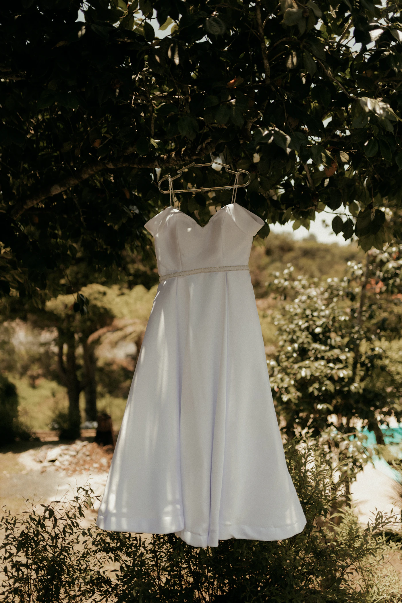 How to choose a wedding dress for apple-shaped bodies — A structured corset bodice defines the waist for a balanced bridal silhouette.