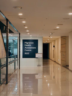 Migration health assessment centre sign on wall.