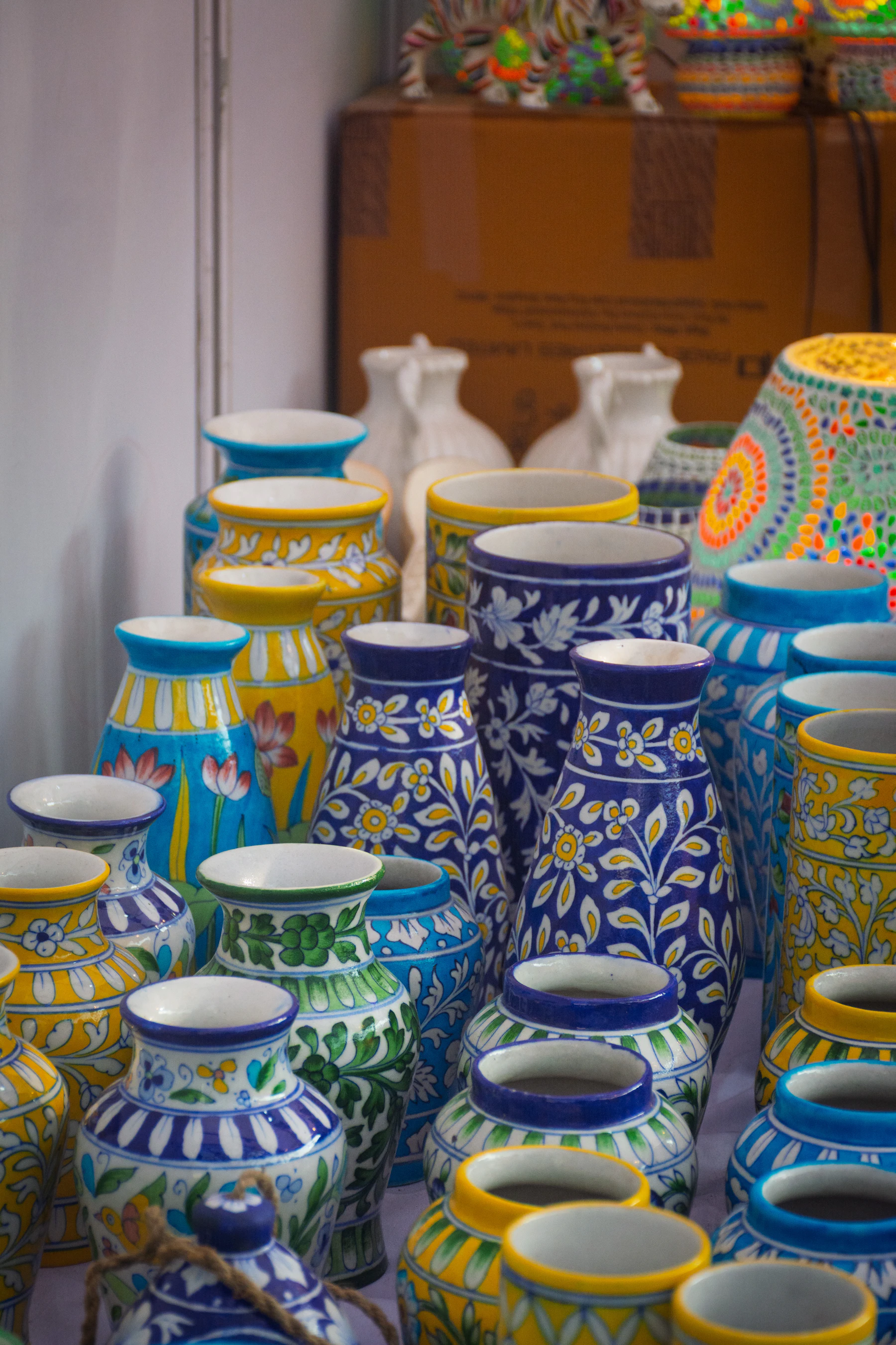 Colourful ceramic vases with floral patterns