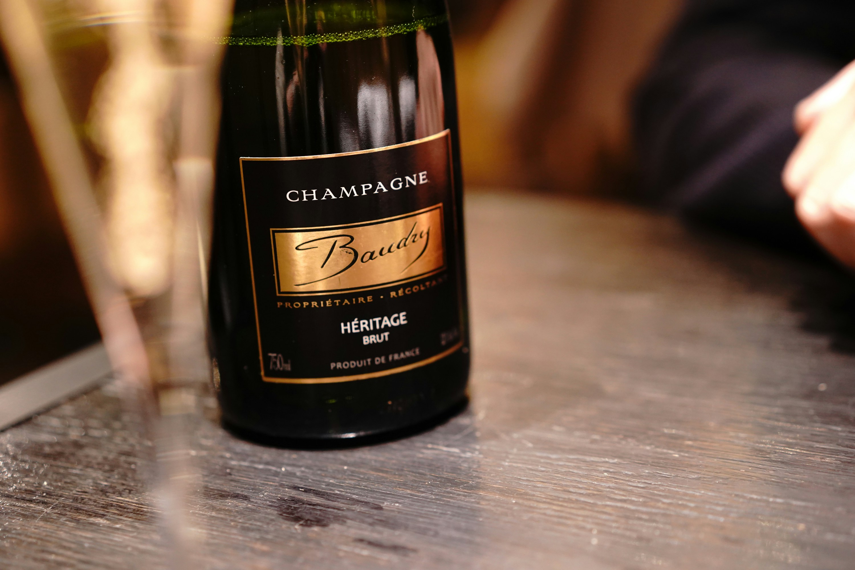 A bottle of baudry champagne heritage brut