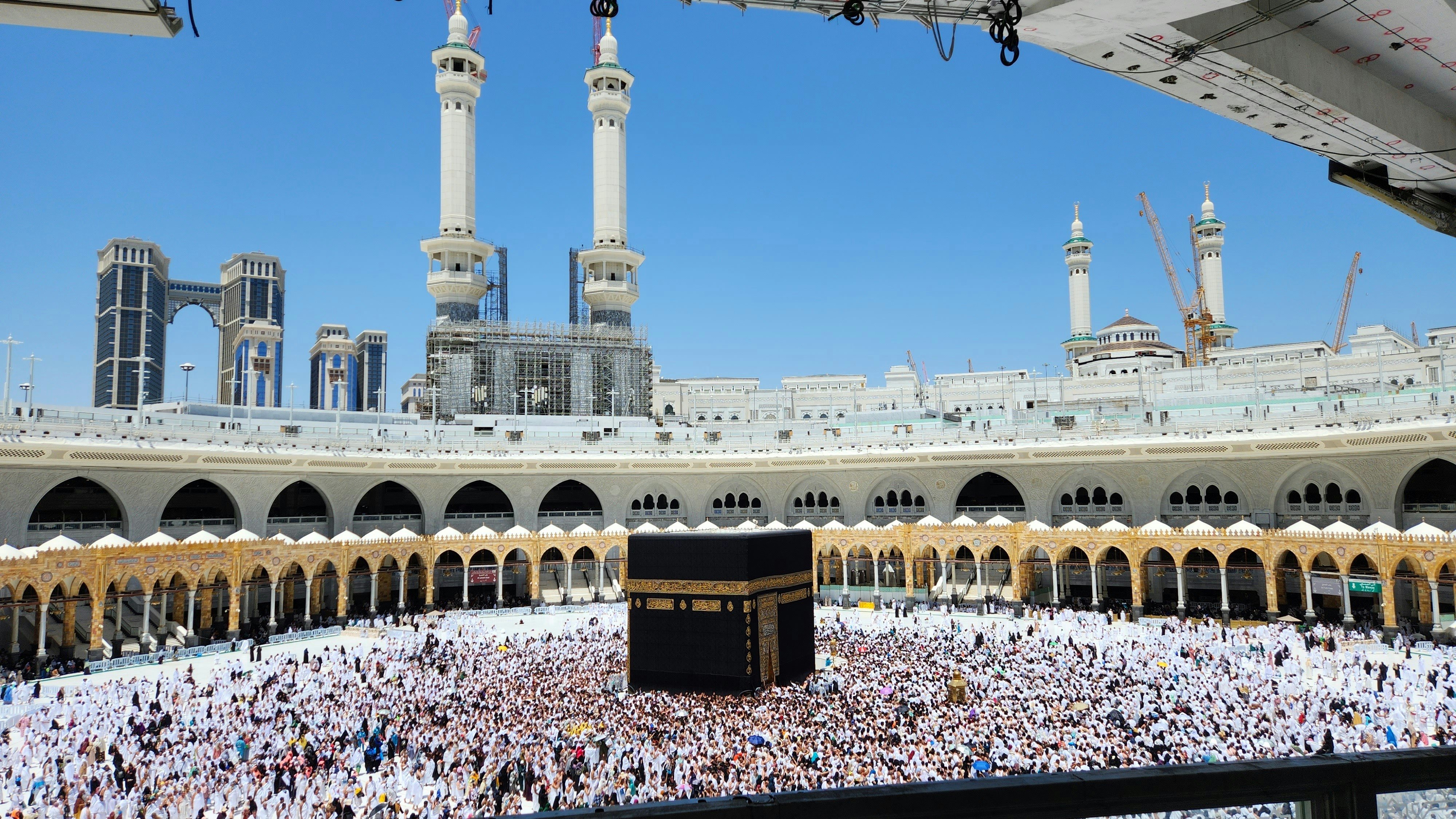 Pilgrims surround the kaaba at the grand mosque in mecca.