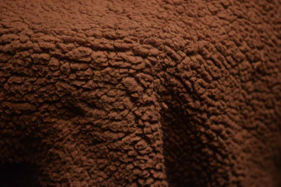 Close-up of a textured brown fabric
