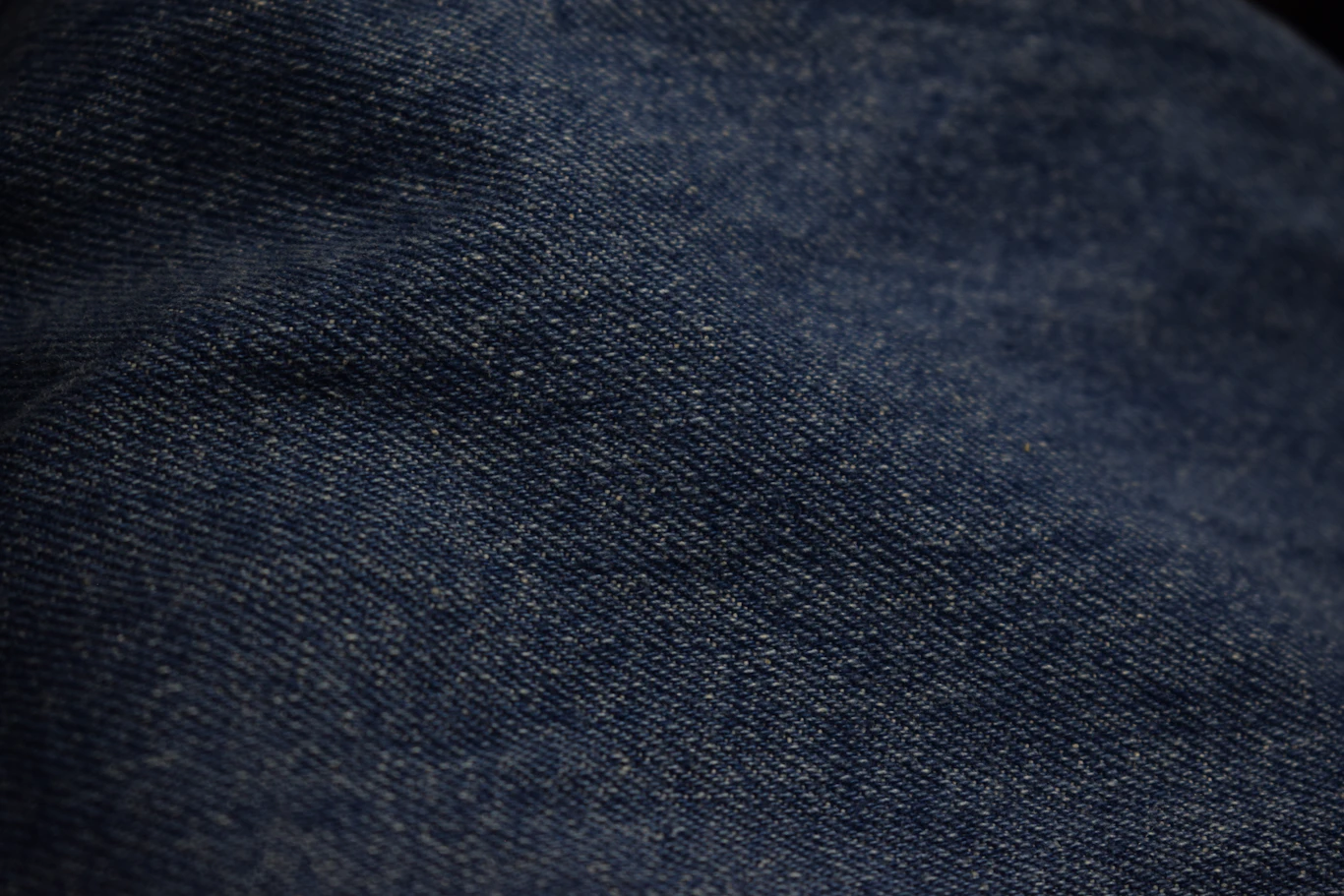 Dark indigo selvedge texture under raking light
