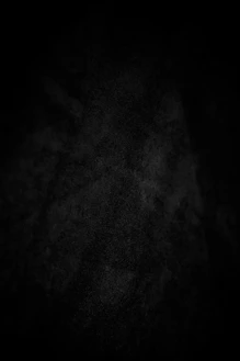 A dark, textured background with subtle white speckles.