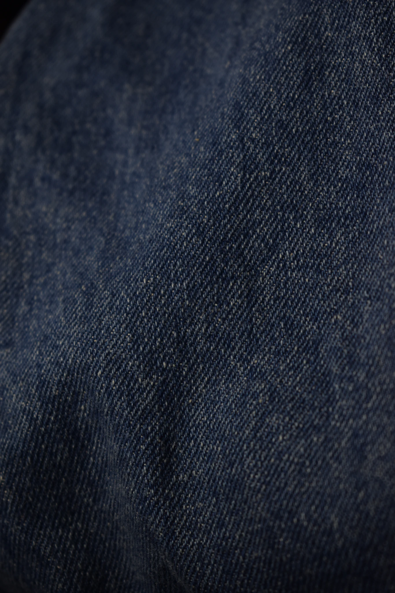 Raw indigo denim weave, macro of the warp-faced twill