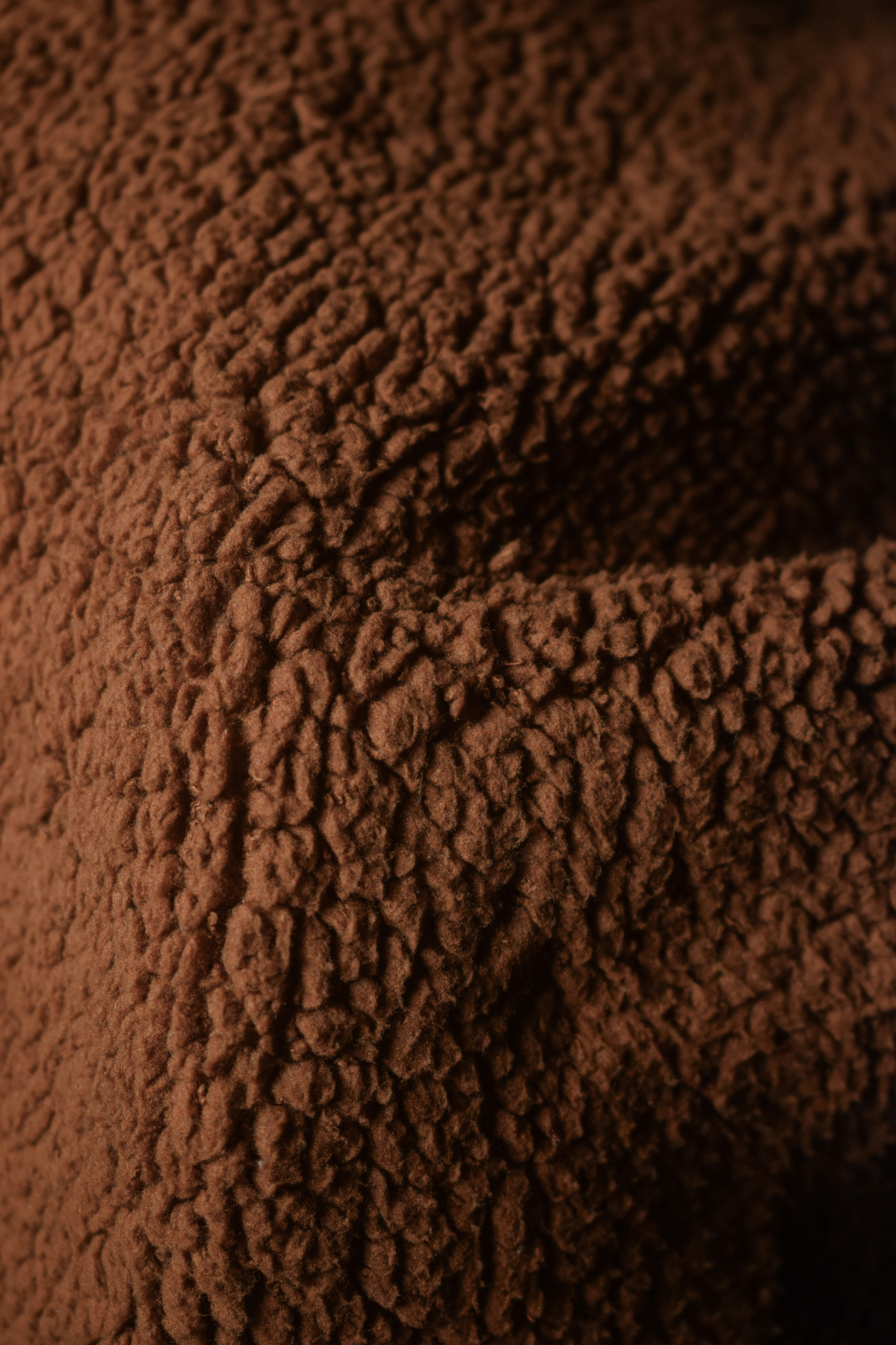 Close-up texture of brown fuzzy fabric