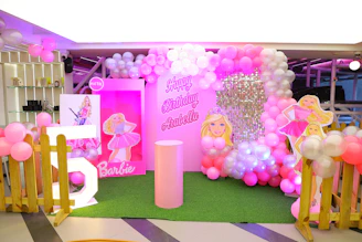 Barbie themed birthday party decoration with balloons