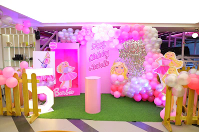 Barbie themed birthday party decoration with balloons
