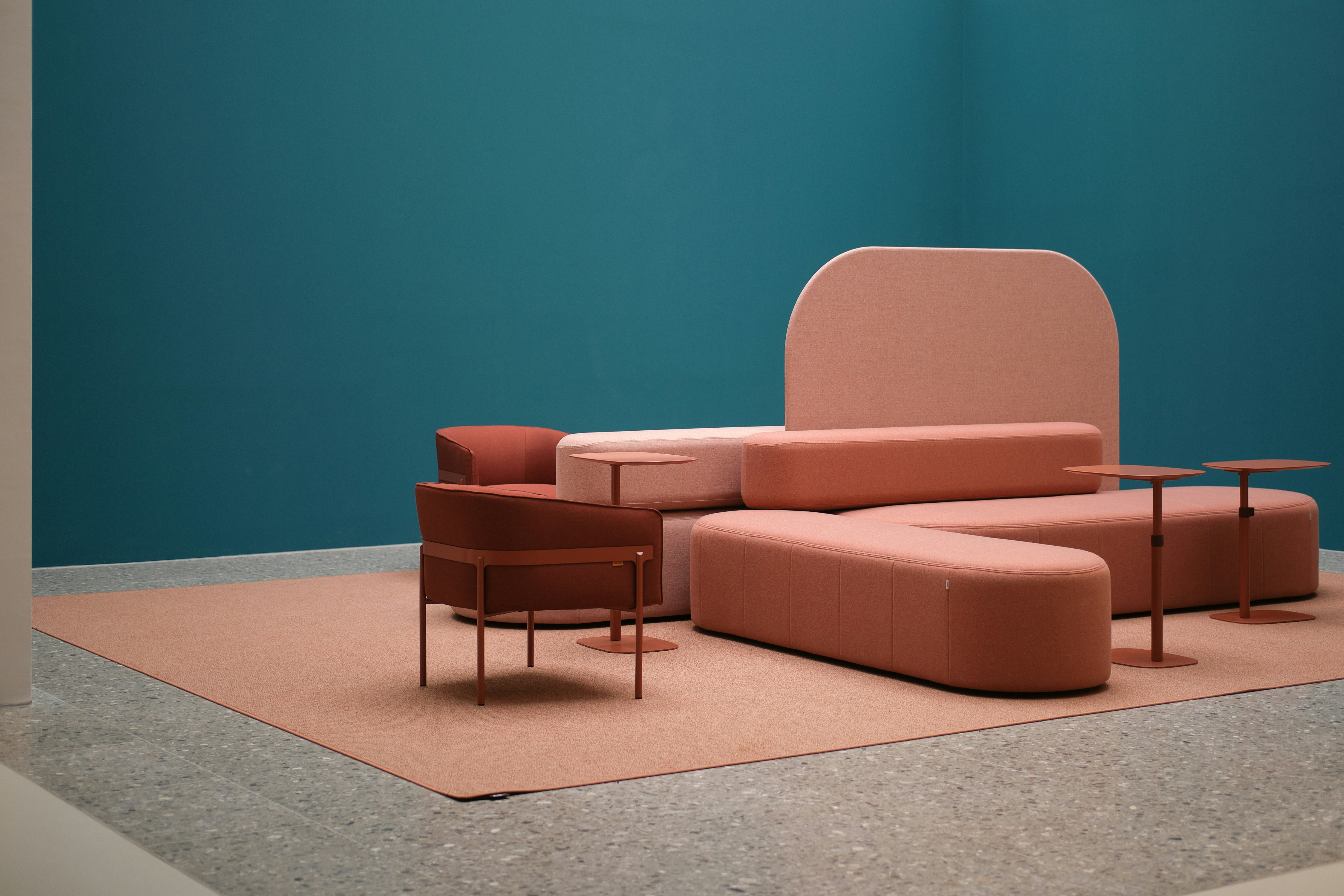 Modern pink modular sofa with side tables