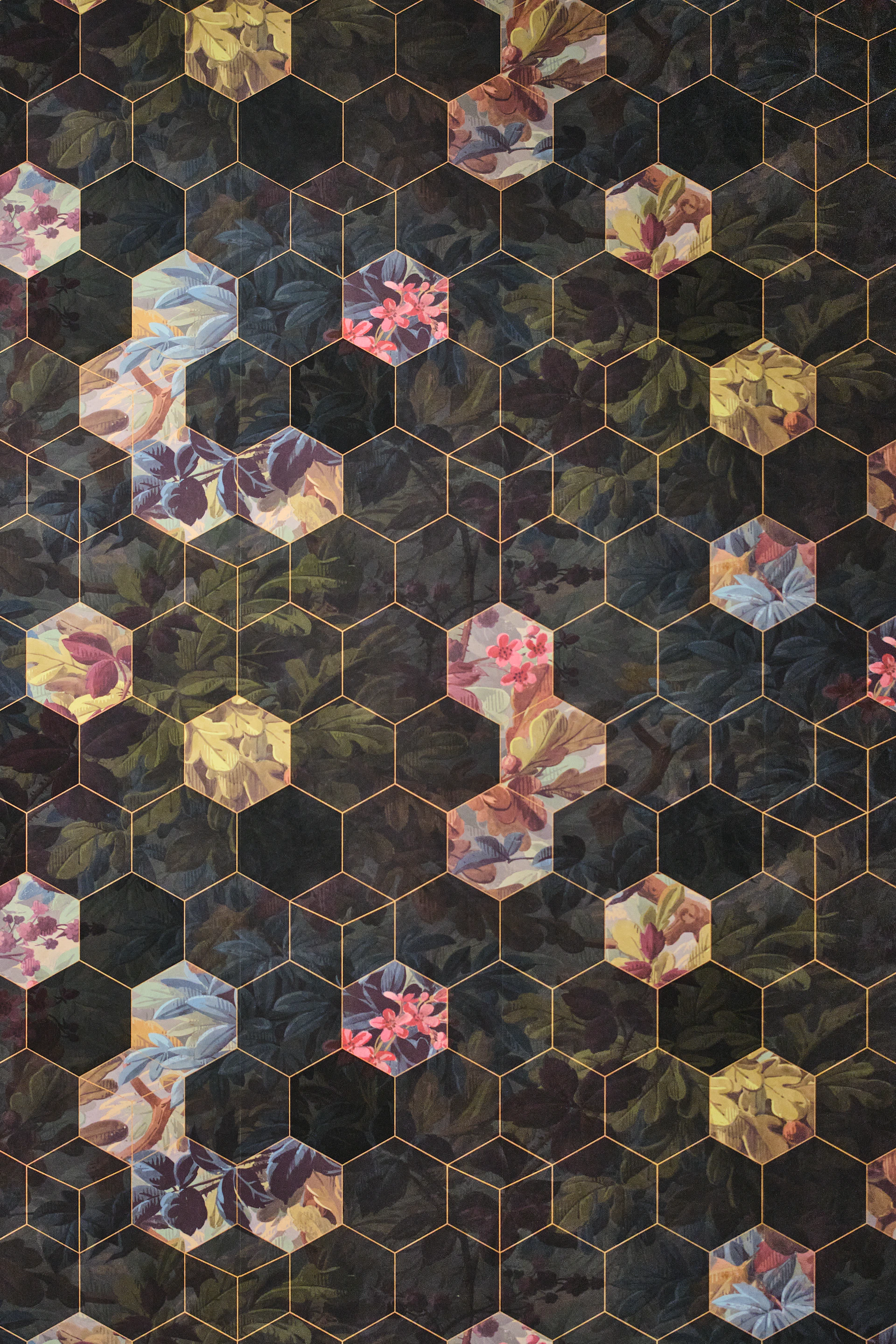 Hexagonal pattern with floral elements on dark background