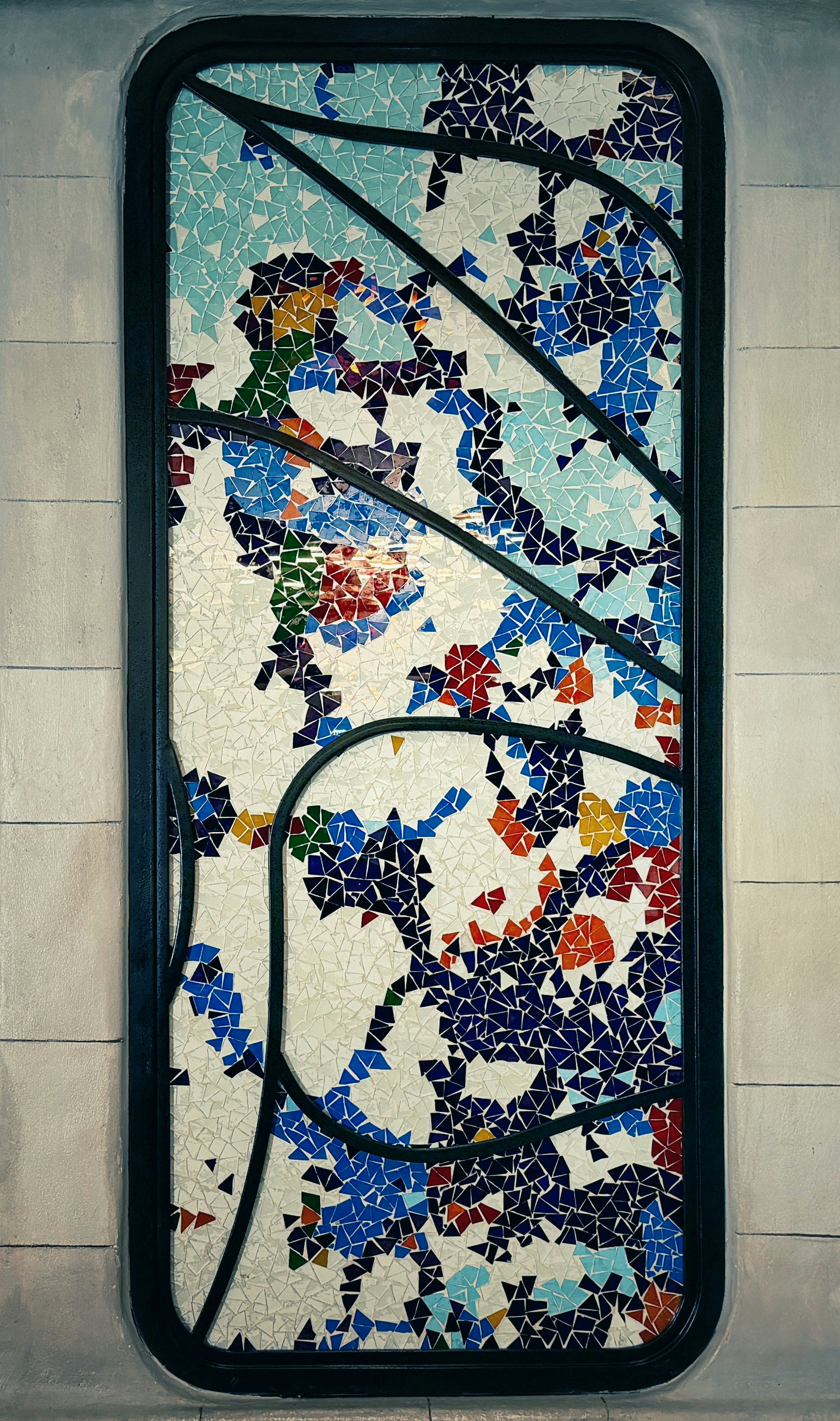 Colorful mosaic artwork with black wavy lines