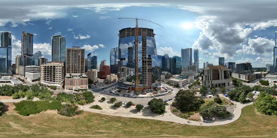 City skyline with skyscrapers and a building under construction