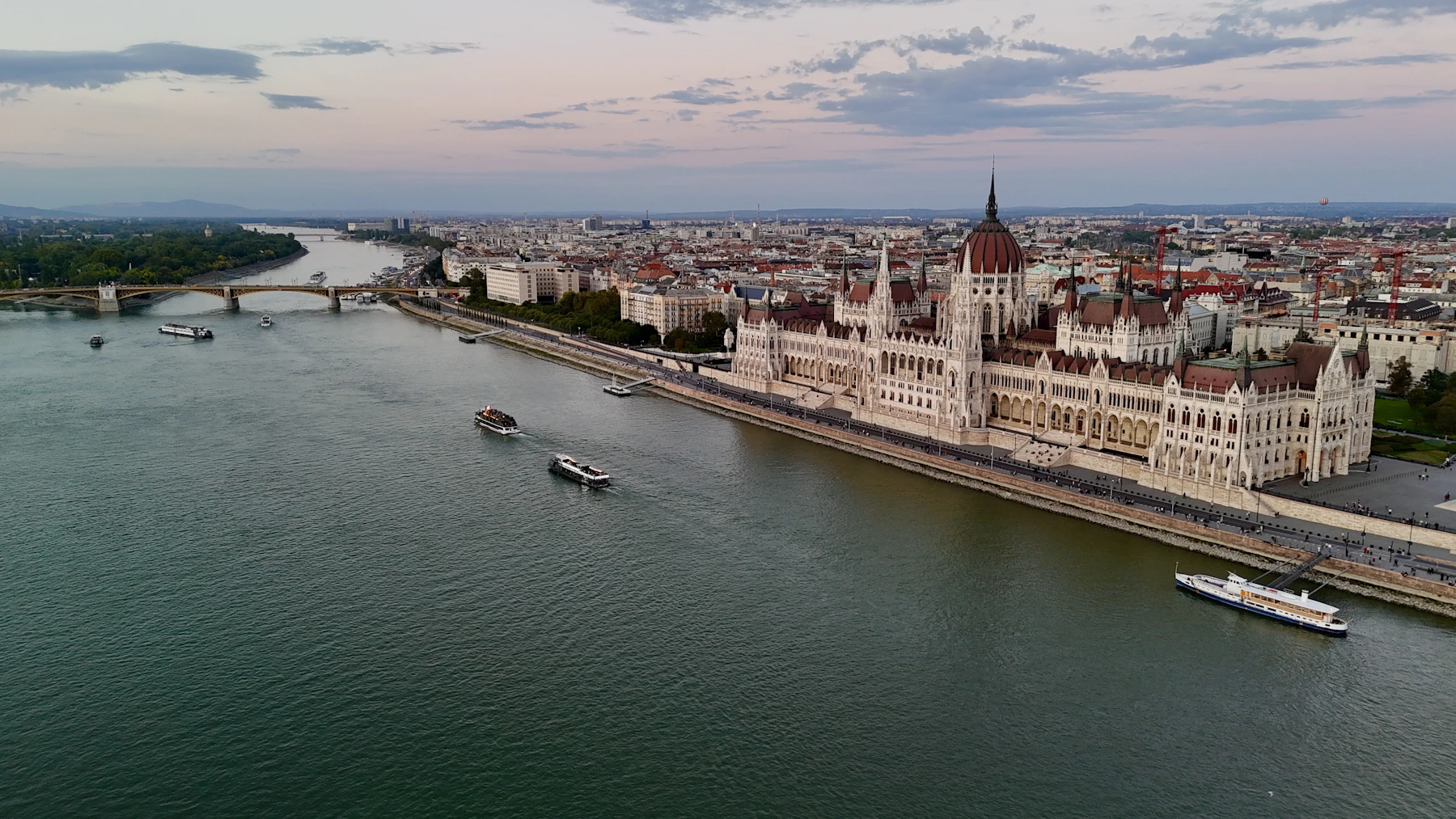 The Hungarian Parliament beside the Danube with central Budapest stretching beyond