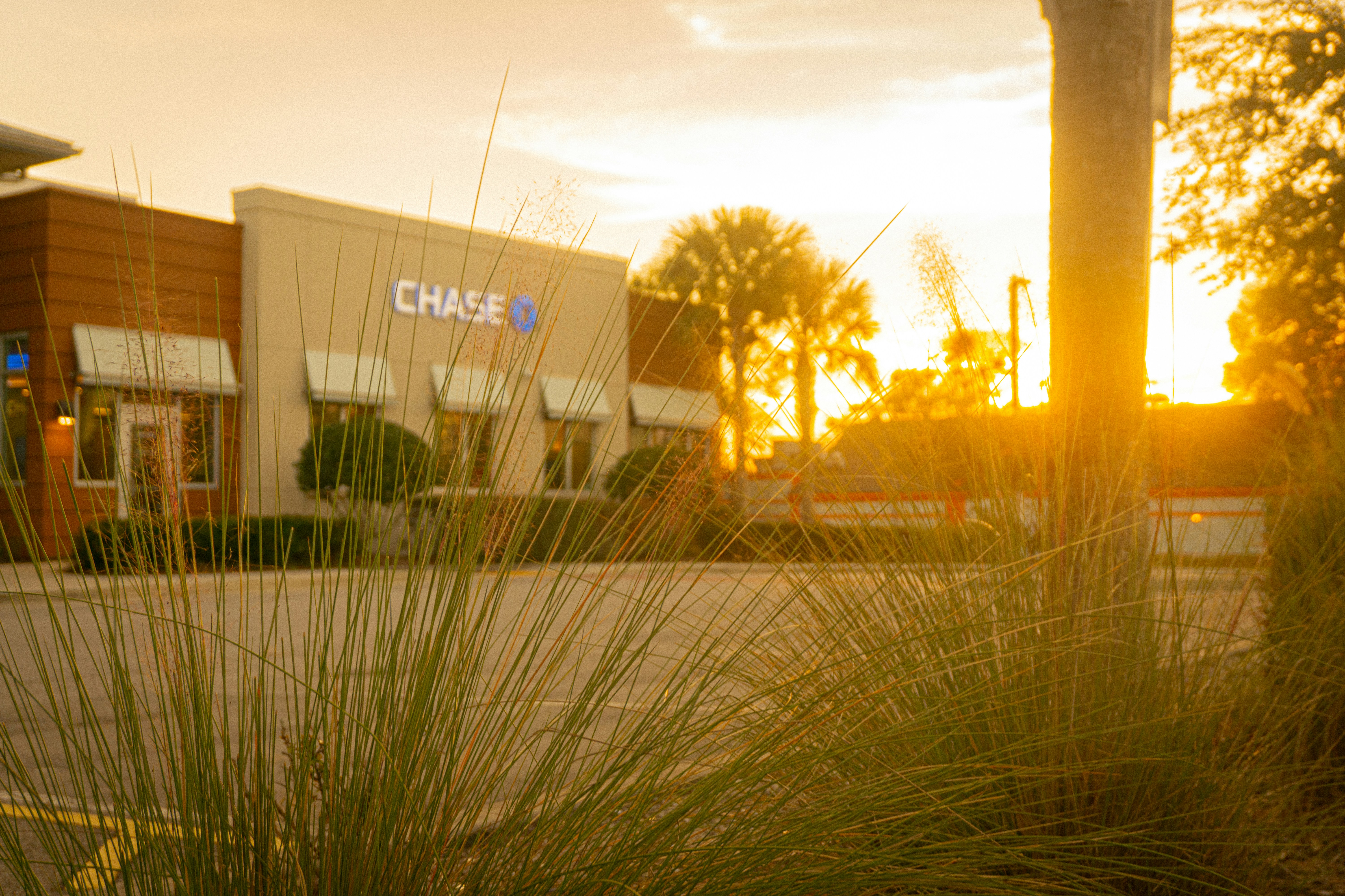Chase bank building at sunset with warm light.