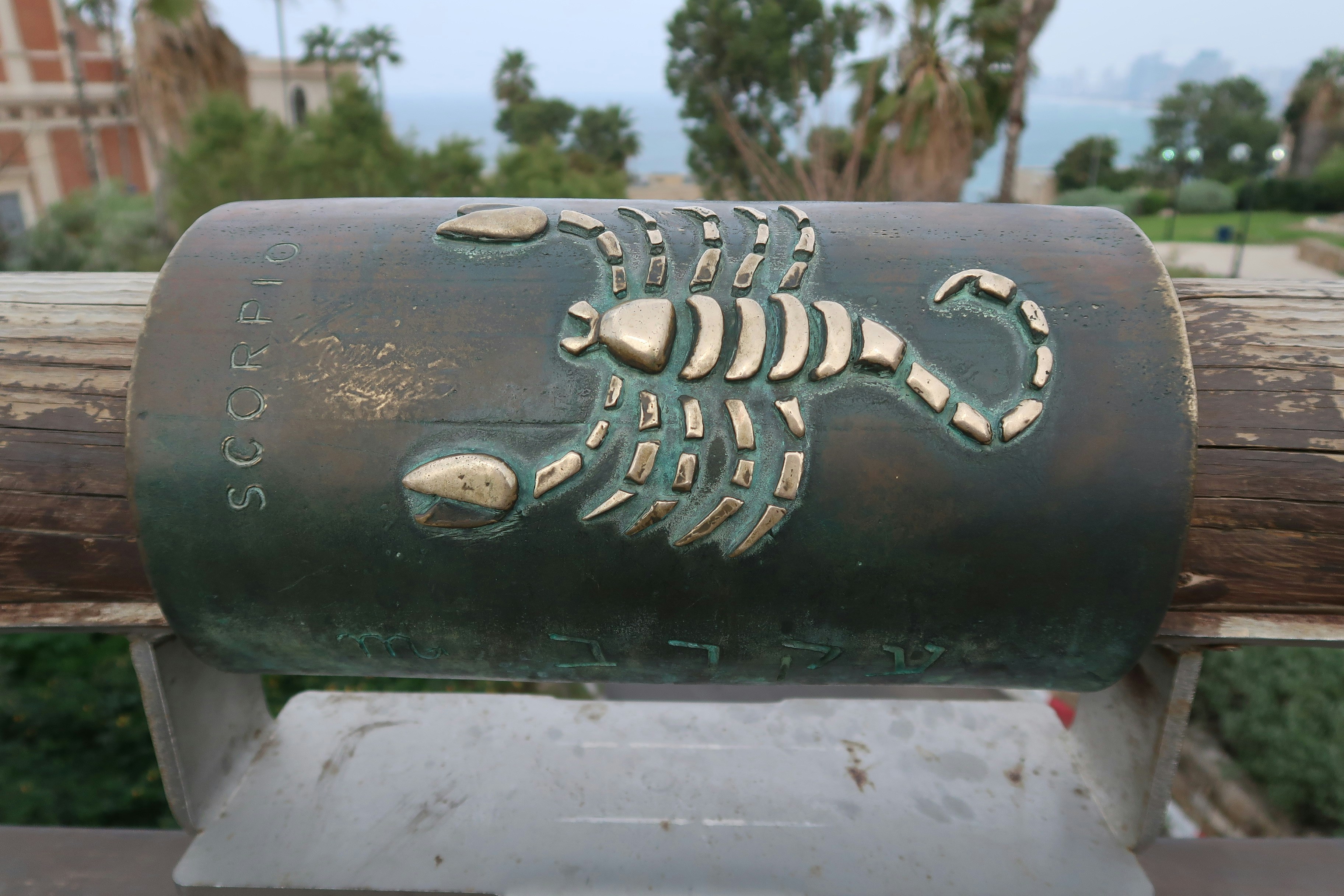 Scorpio zodiac sign on a cylindrical object