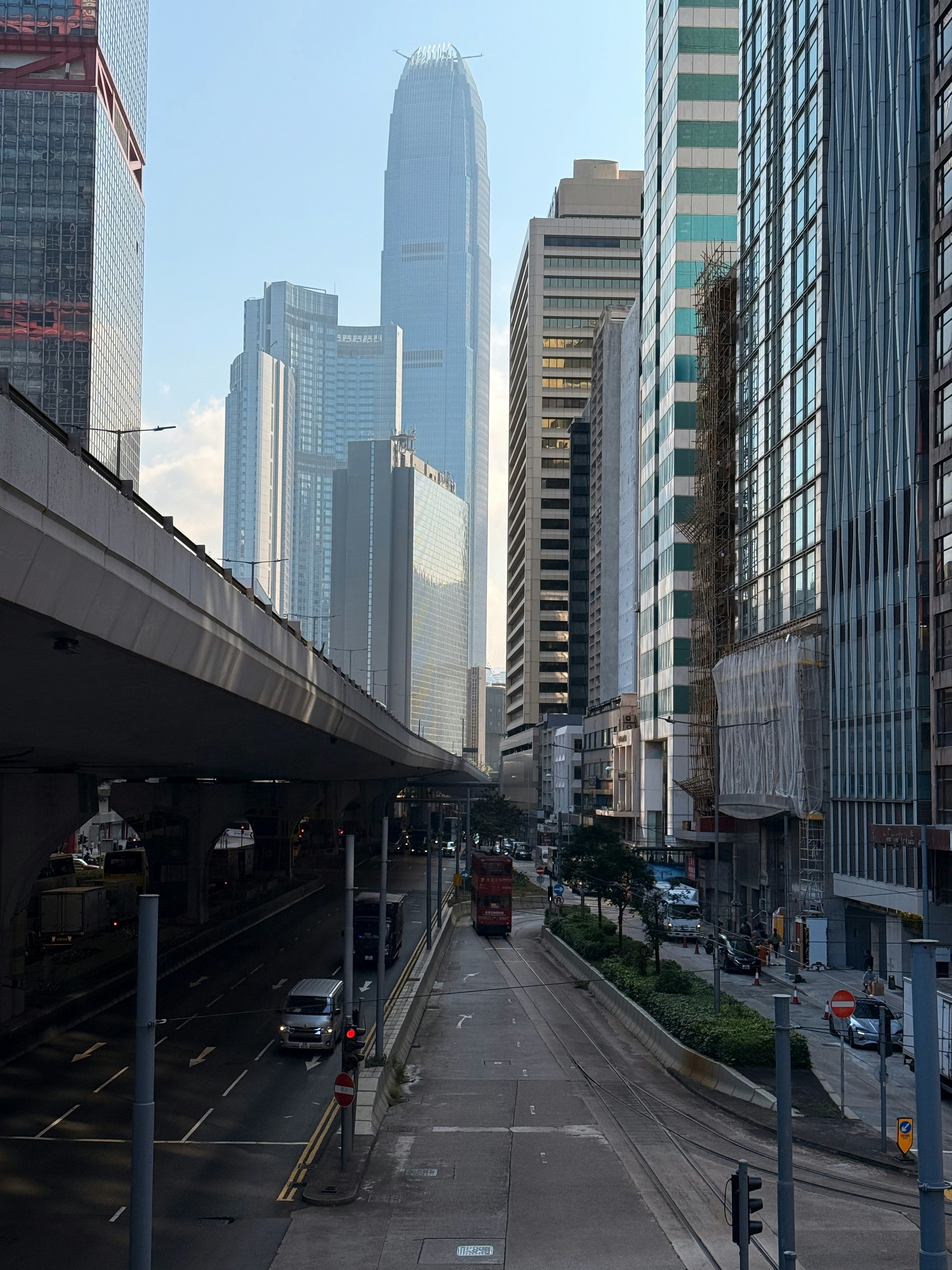 Modern skyscrapers and busy street in a city.