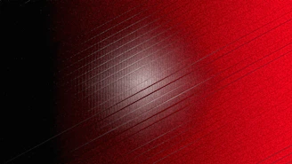Red and black gradient with textured lines.