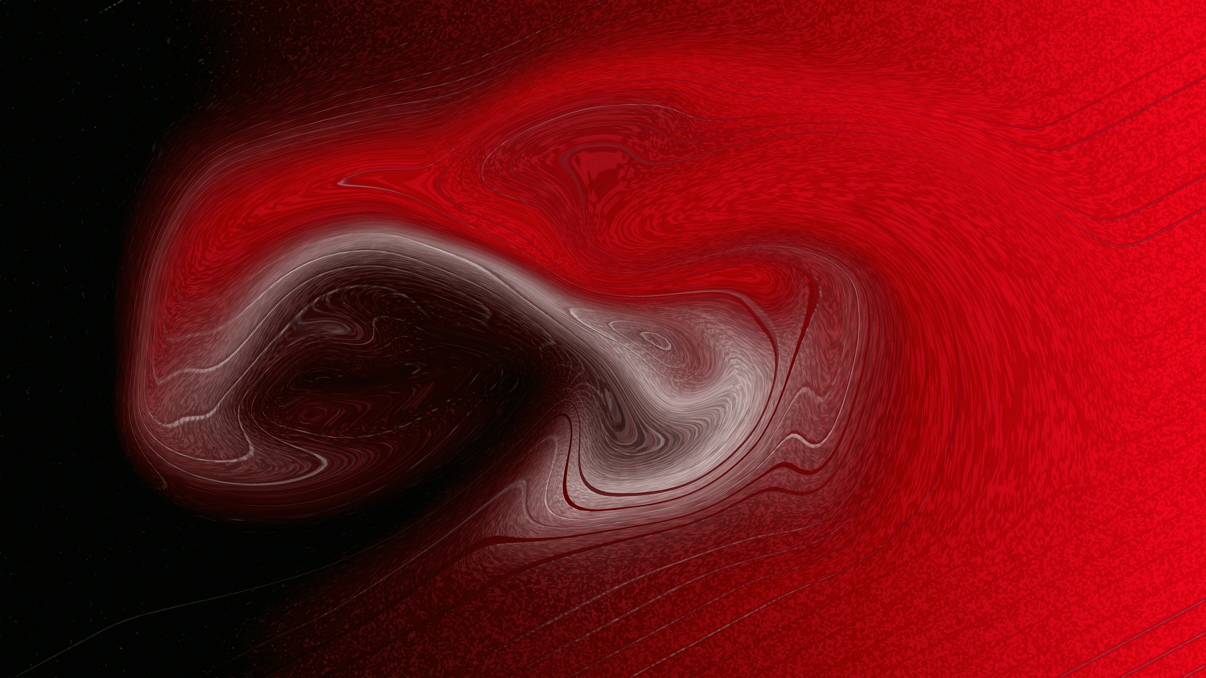 Abstract red and black swirling fluid motion