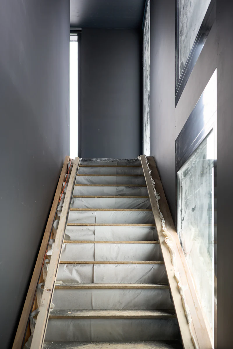 Escalier quart tournant en hêtre — avant