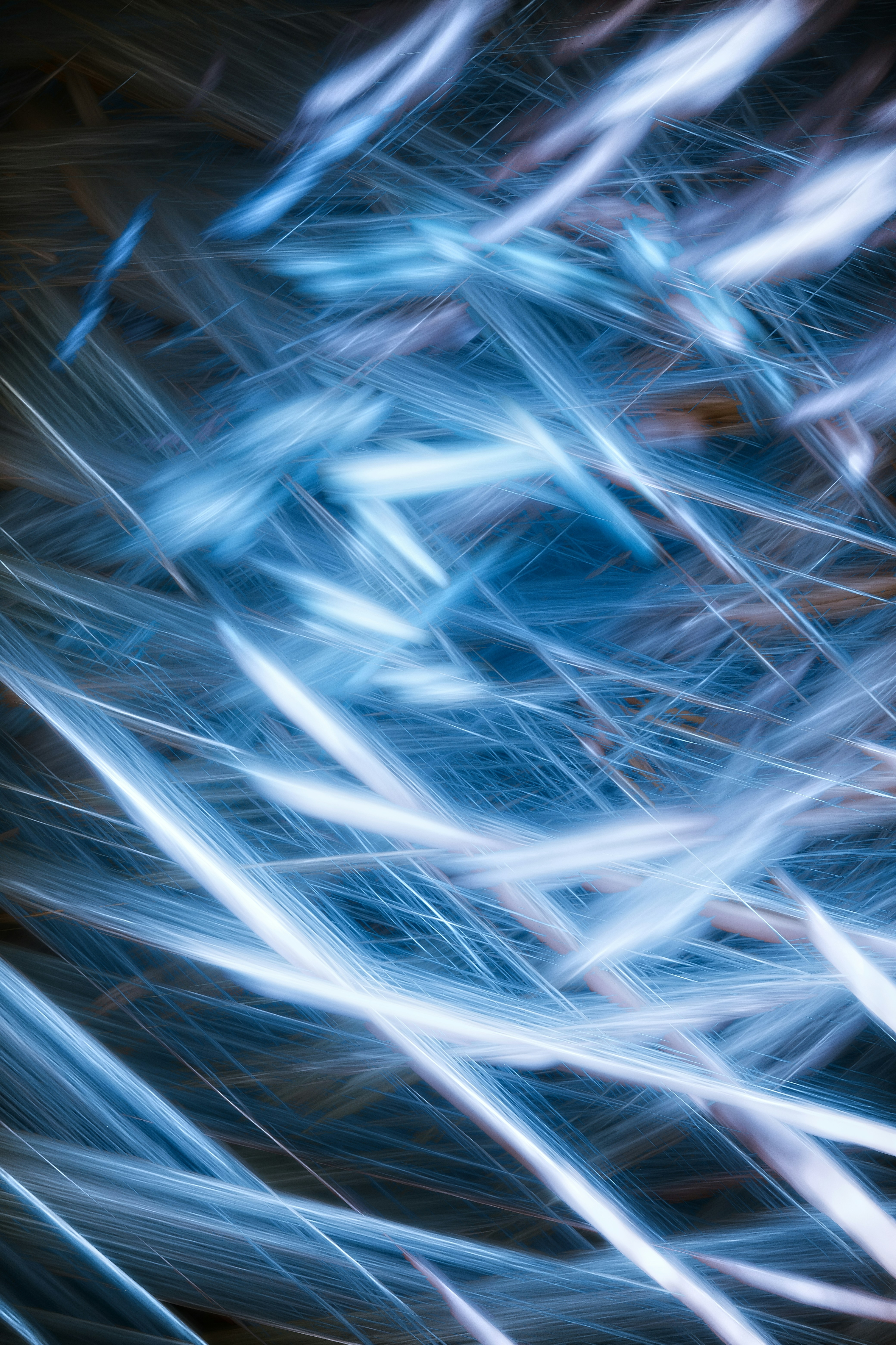 Abstract blue and white light streaks