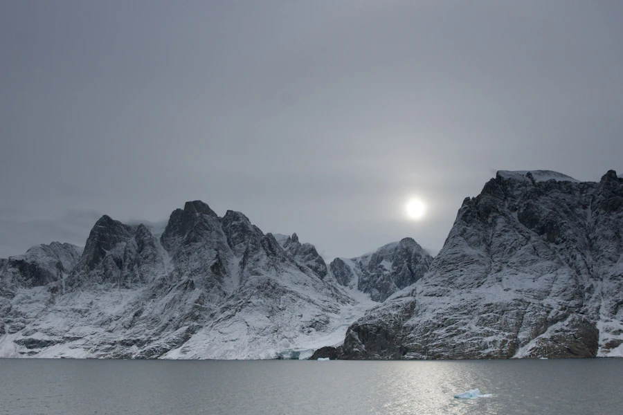 Snow-covered mountains above Scoresby Sund in Greenland
