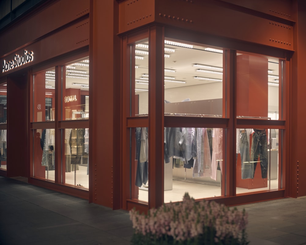 Illuminated corner storefront with broad full-height display windows
