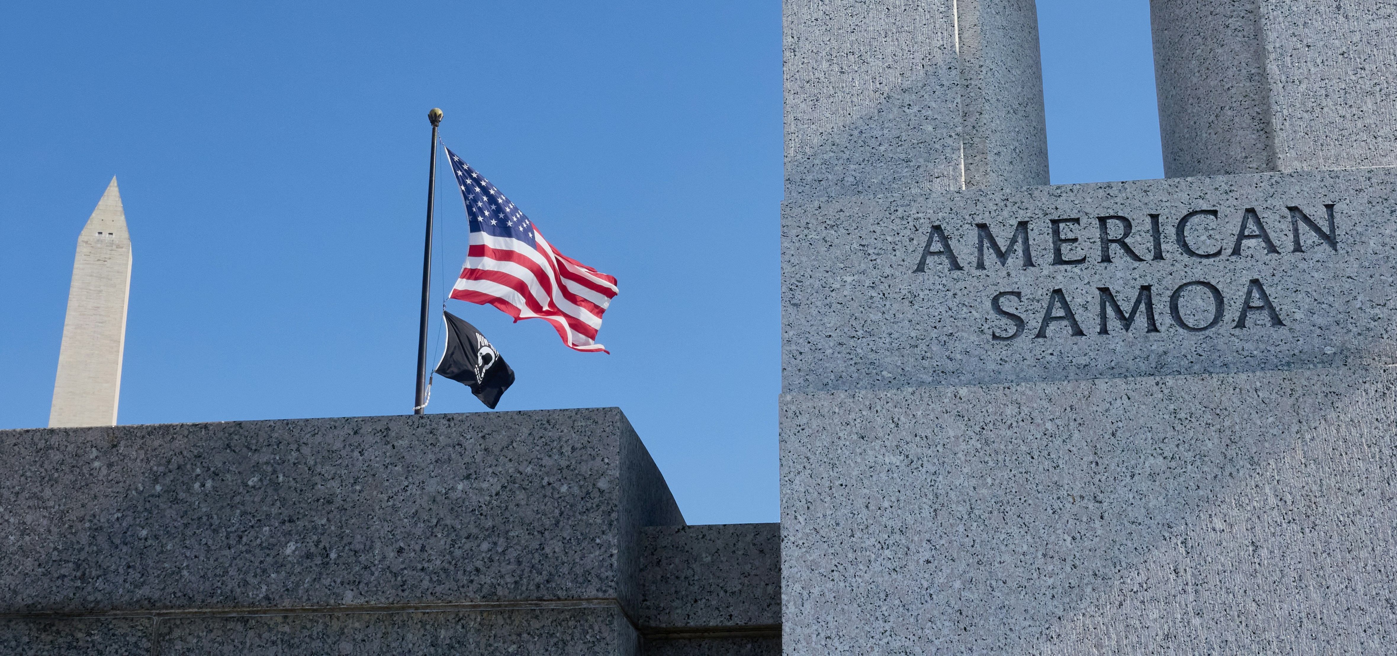 American veteran saluting near a statue of George Washington - Presidents' Day Discounts For Army Veterans