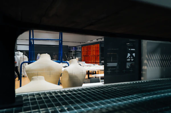 Mannequins in a clothing workshop with sewing supplies