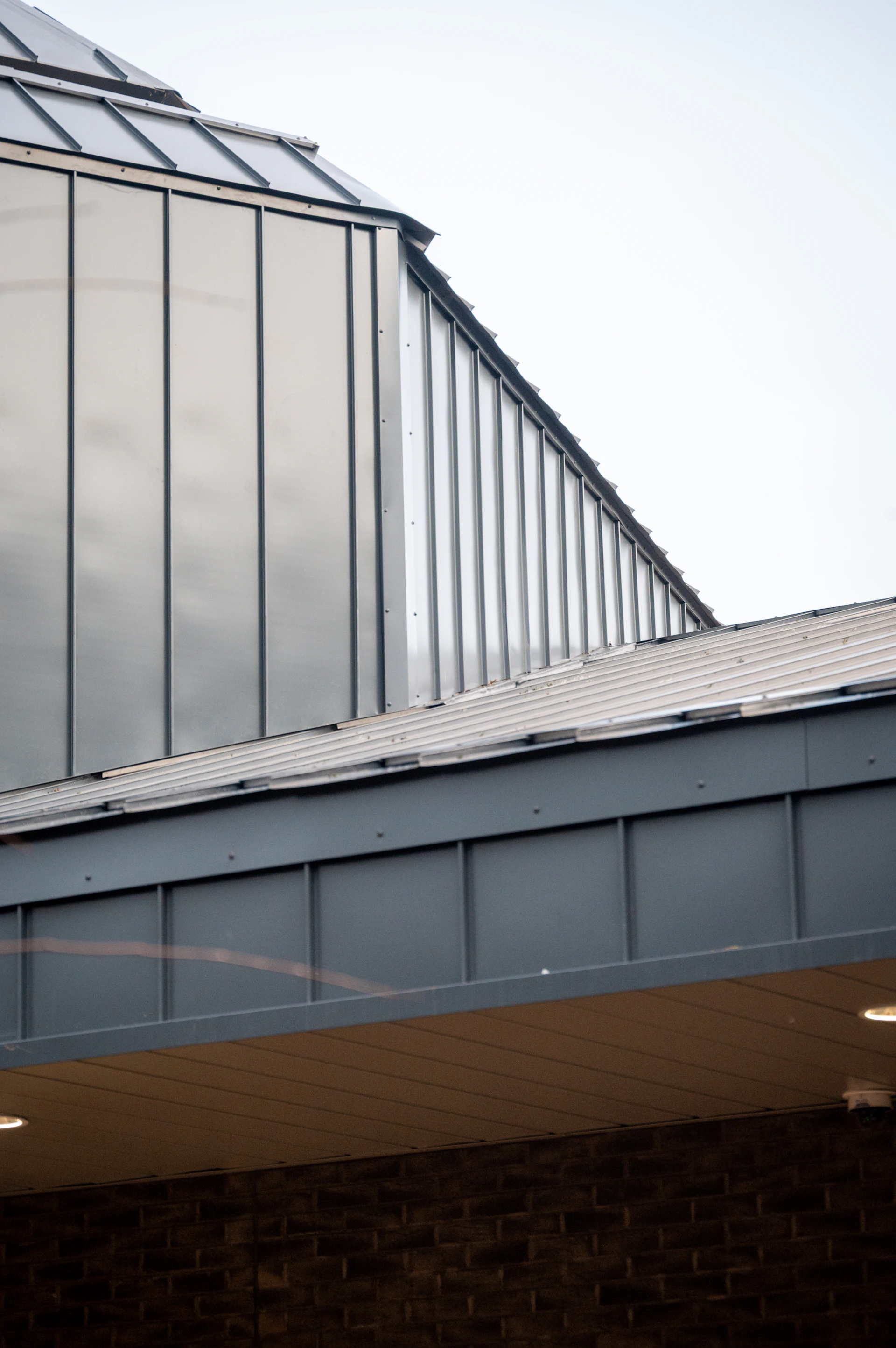 Modern building with metallic facade and glass windows