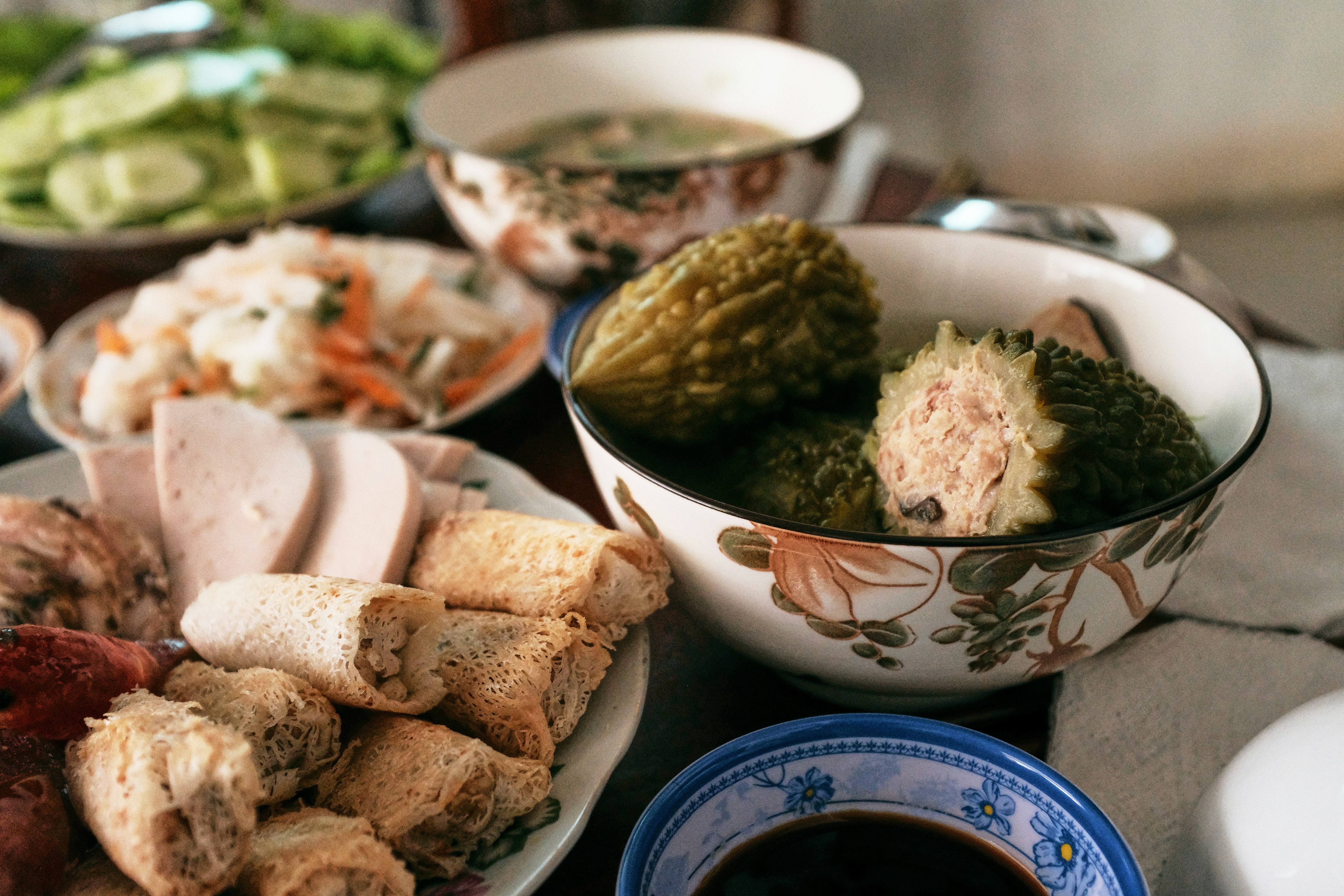 A spread of vietnamese food with stuffed bitter melon. photo – Free ...