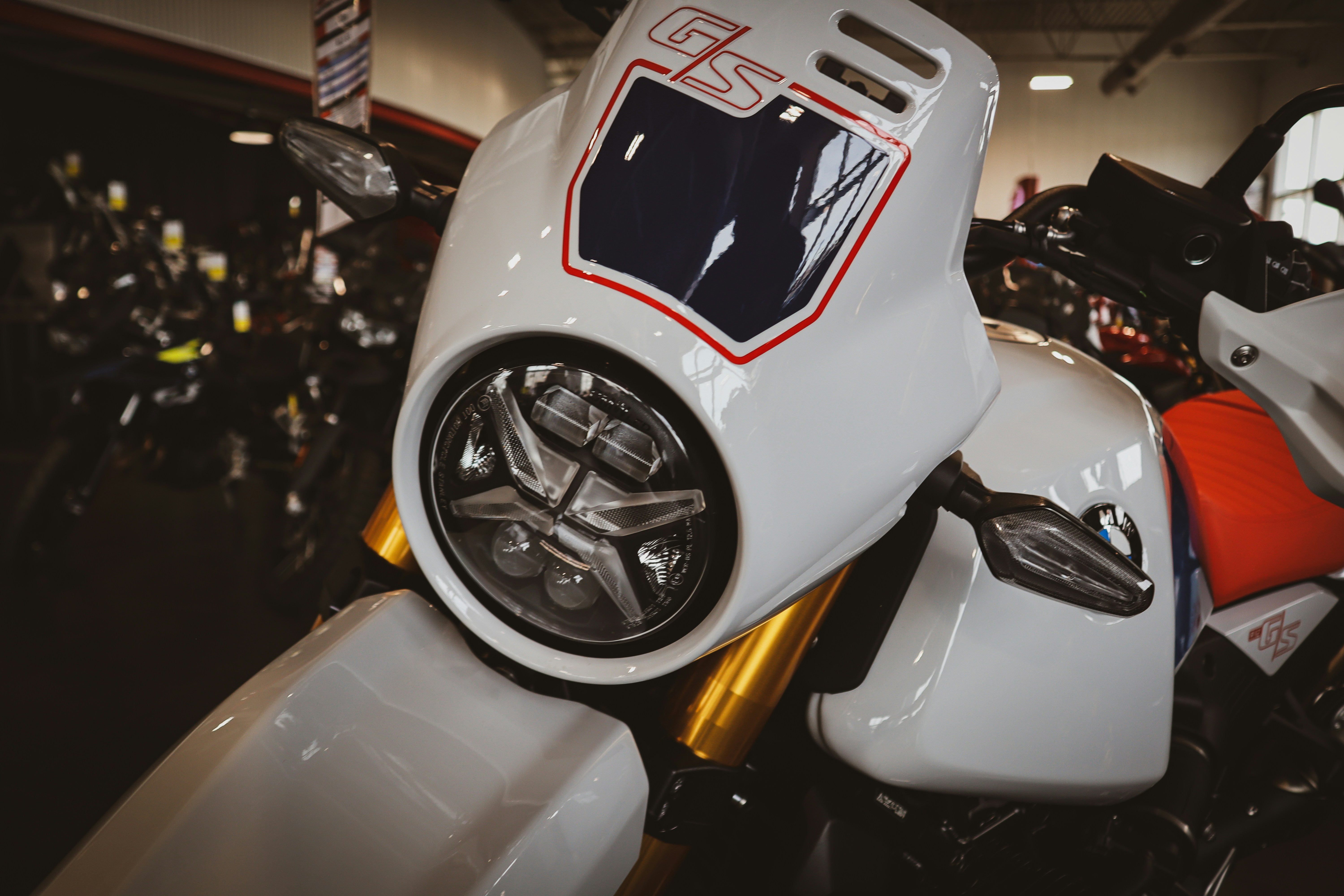 White motorcycle with a modern led headlight