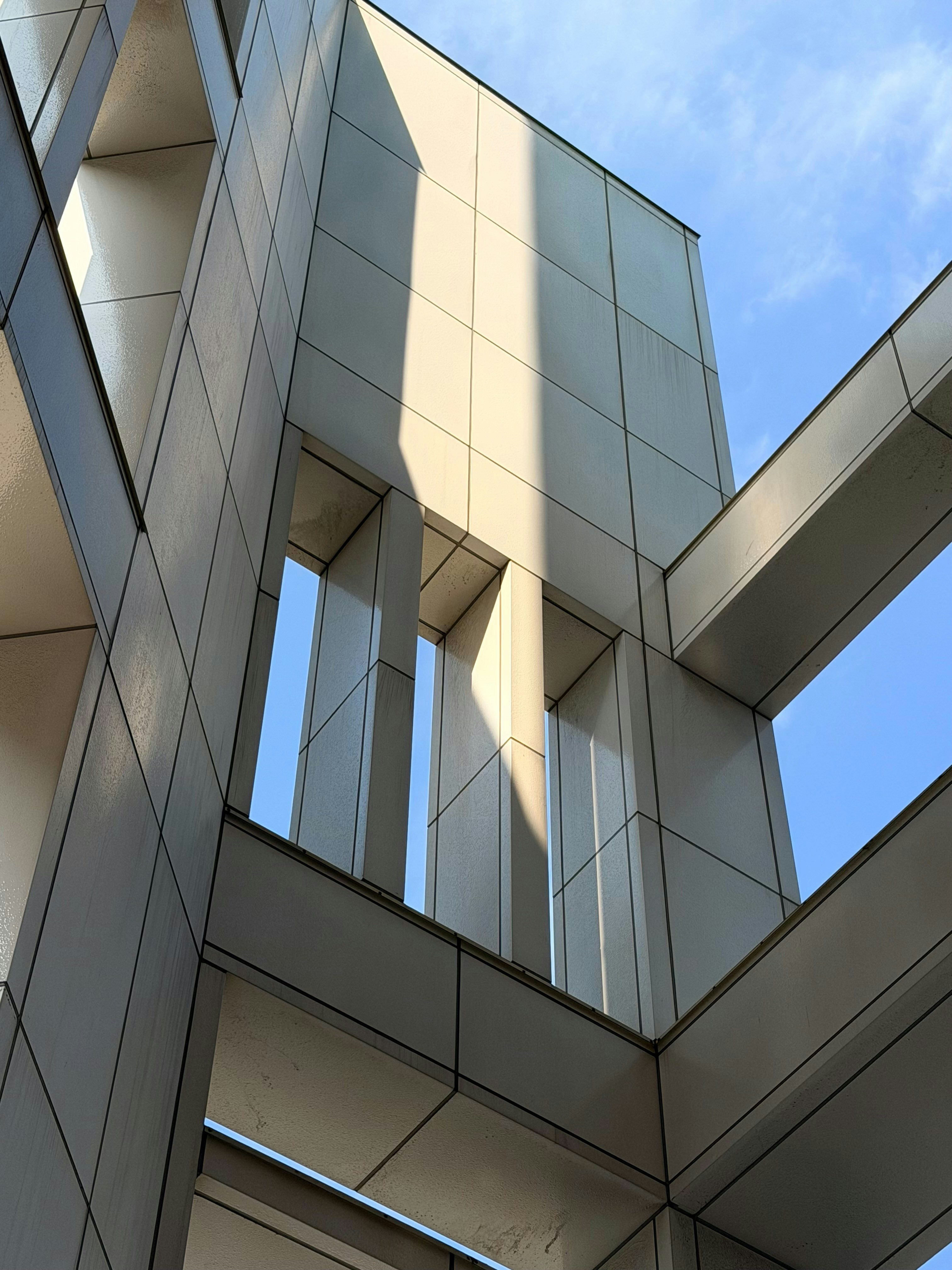 Modern building with geometric shapes and shadows