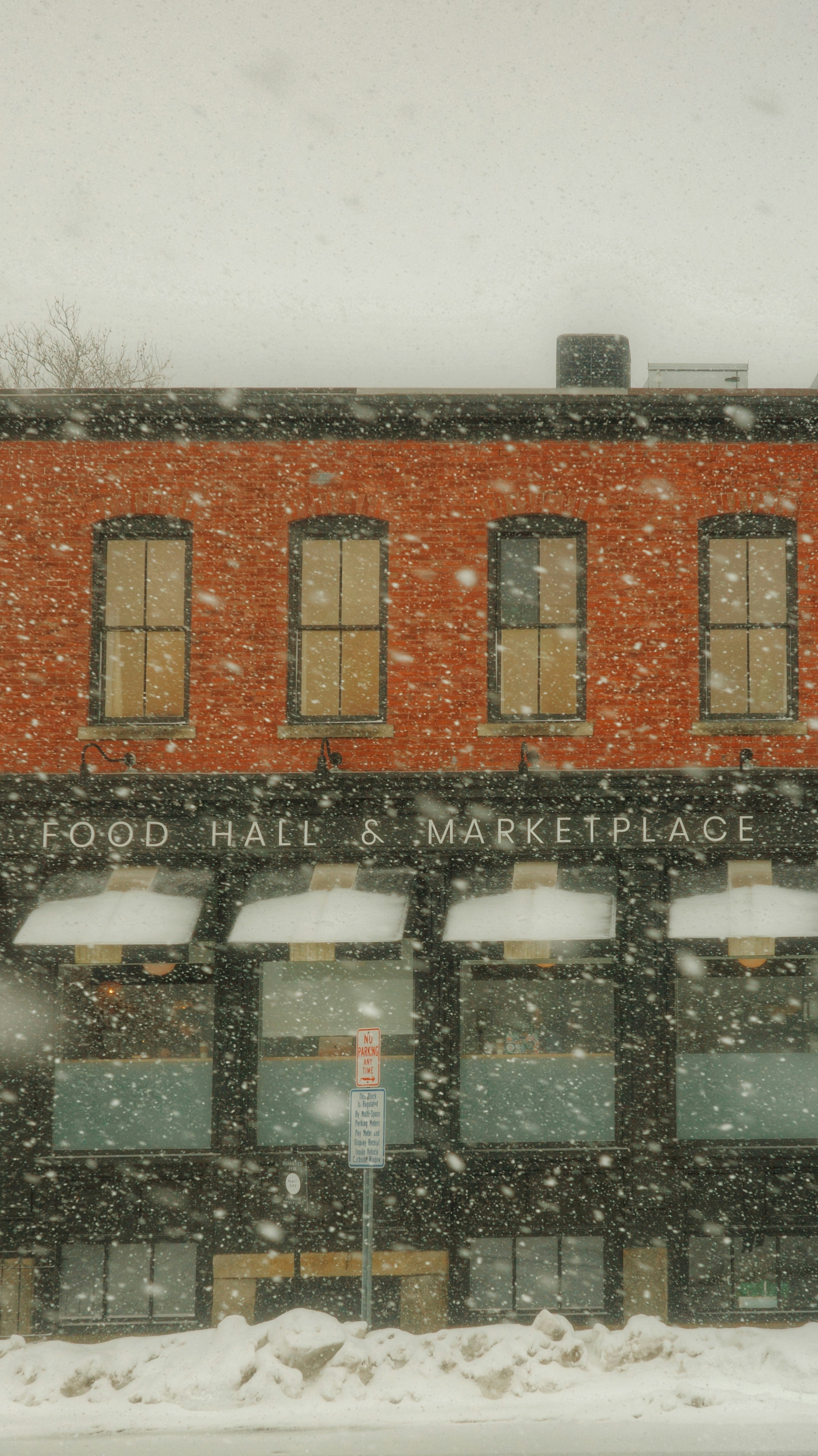 Food hall & marketplace building during a snowstorm