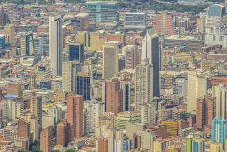 A dense cityscape with numerous tall buildings.