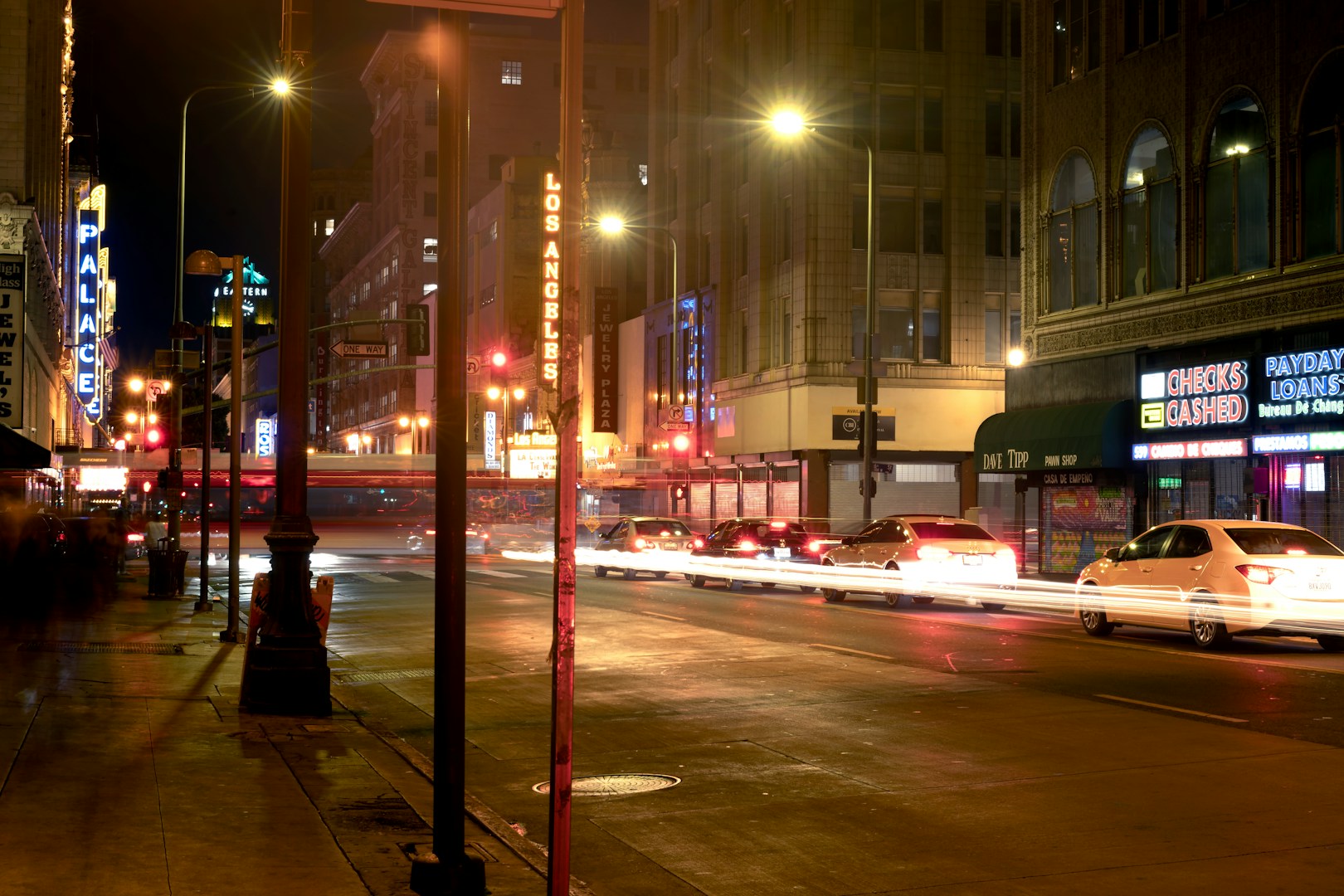 Los Angeles city street at night with car light trails