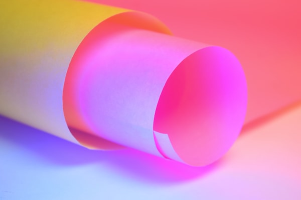 Rolled sheets of colored lighting gel