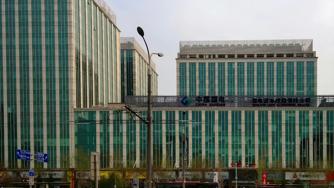 Several modern office towers in a city business district at midday