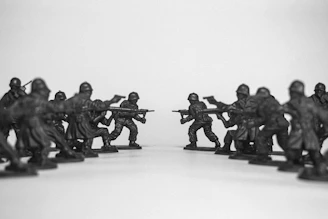 Two rows of toy soldiers face each other