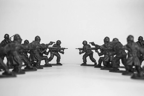 Two rows of toy soldiers face each other