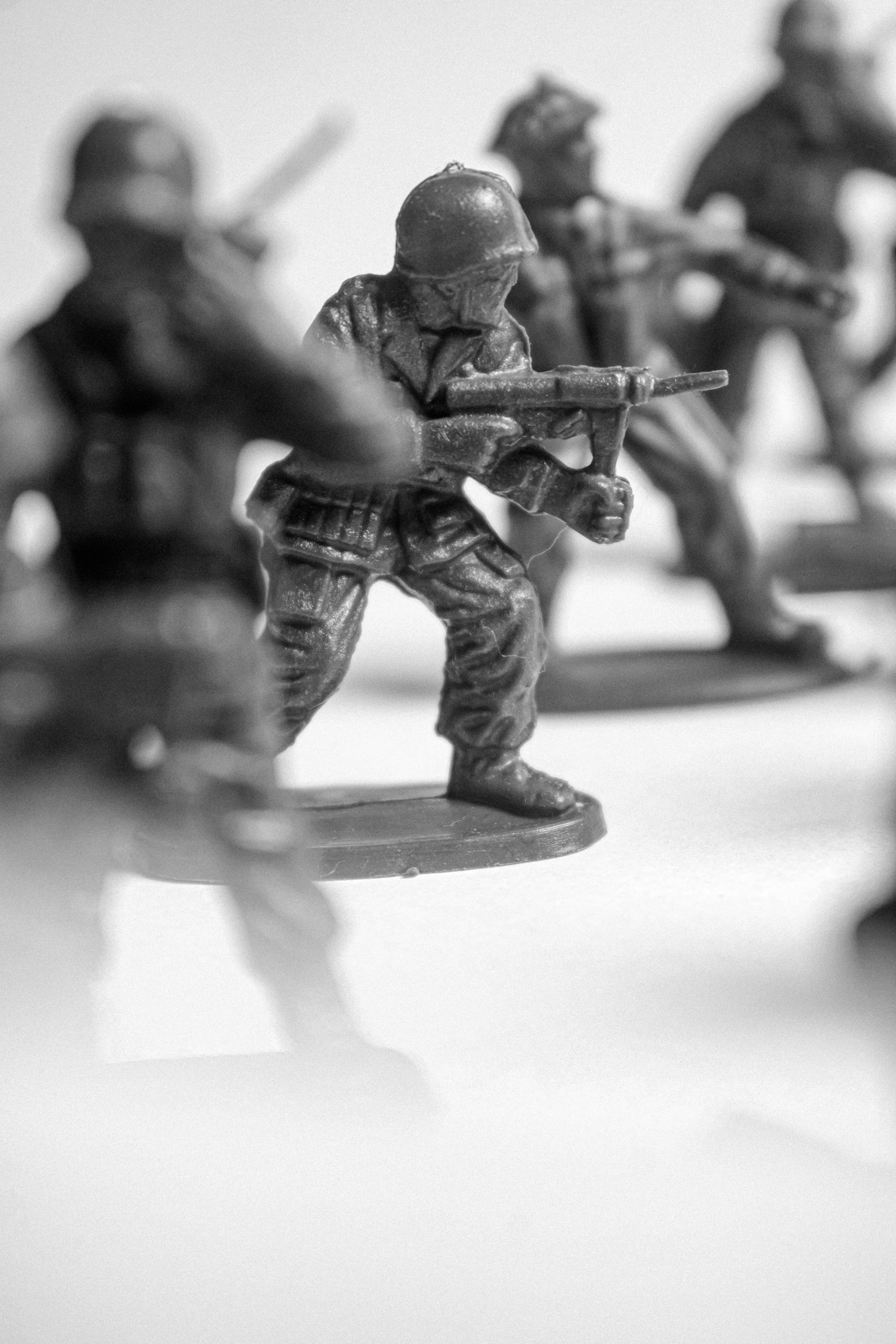 Toy soldiers in formation with rifles.