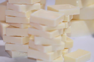 Stacks of small white rectangular bars