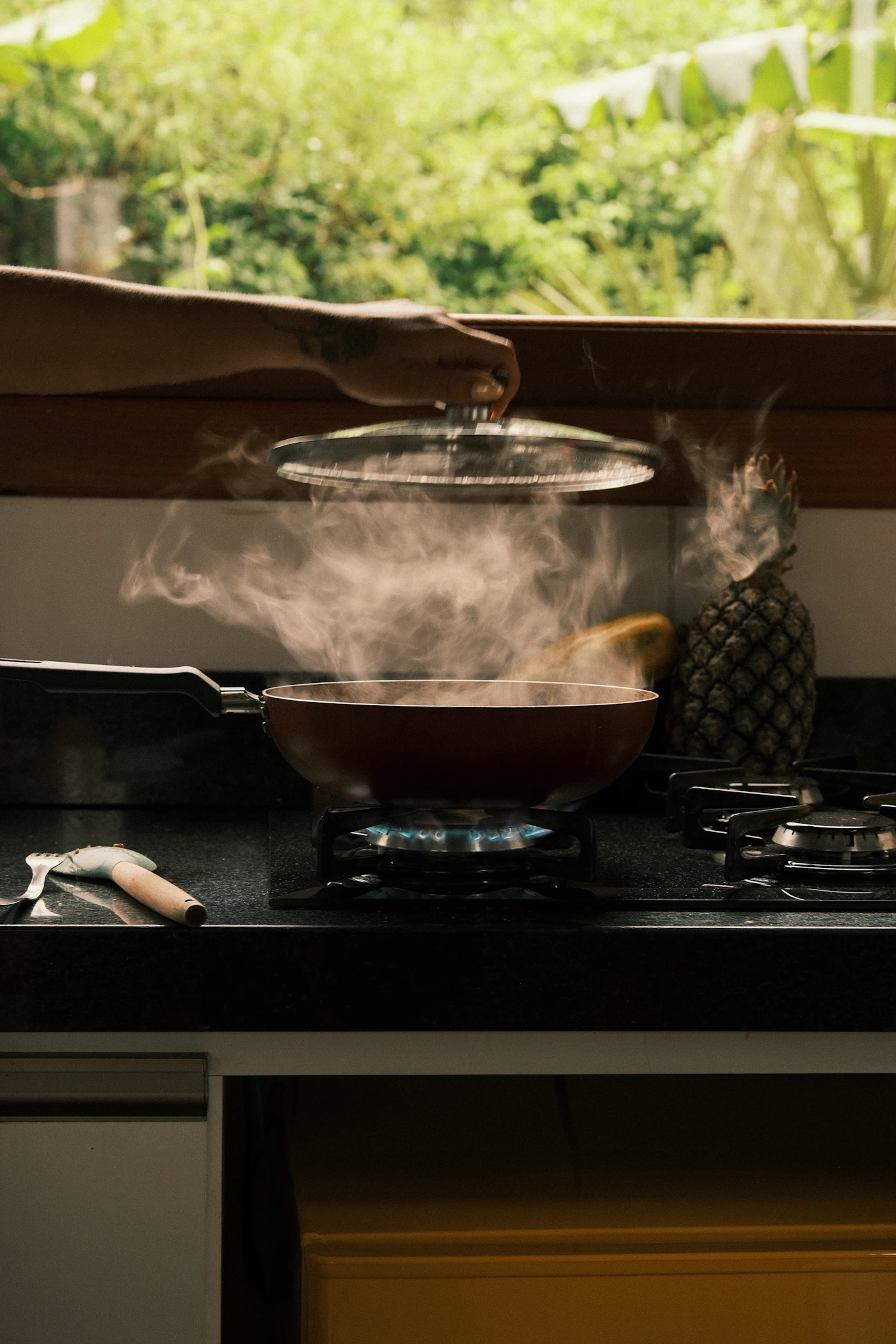 Pan cooking over a gas flame representing routine appliance use