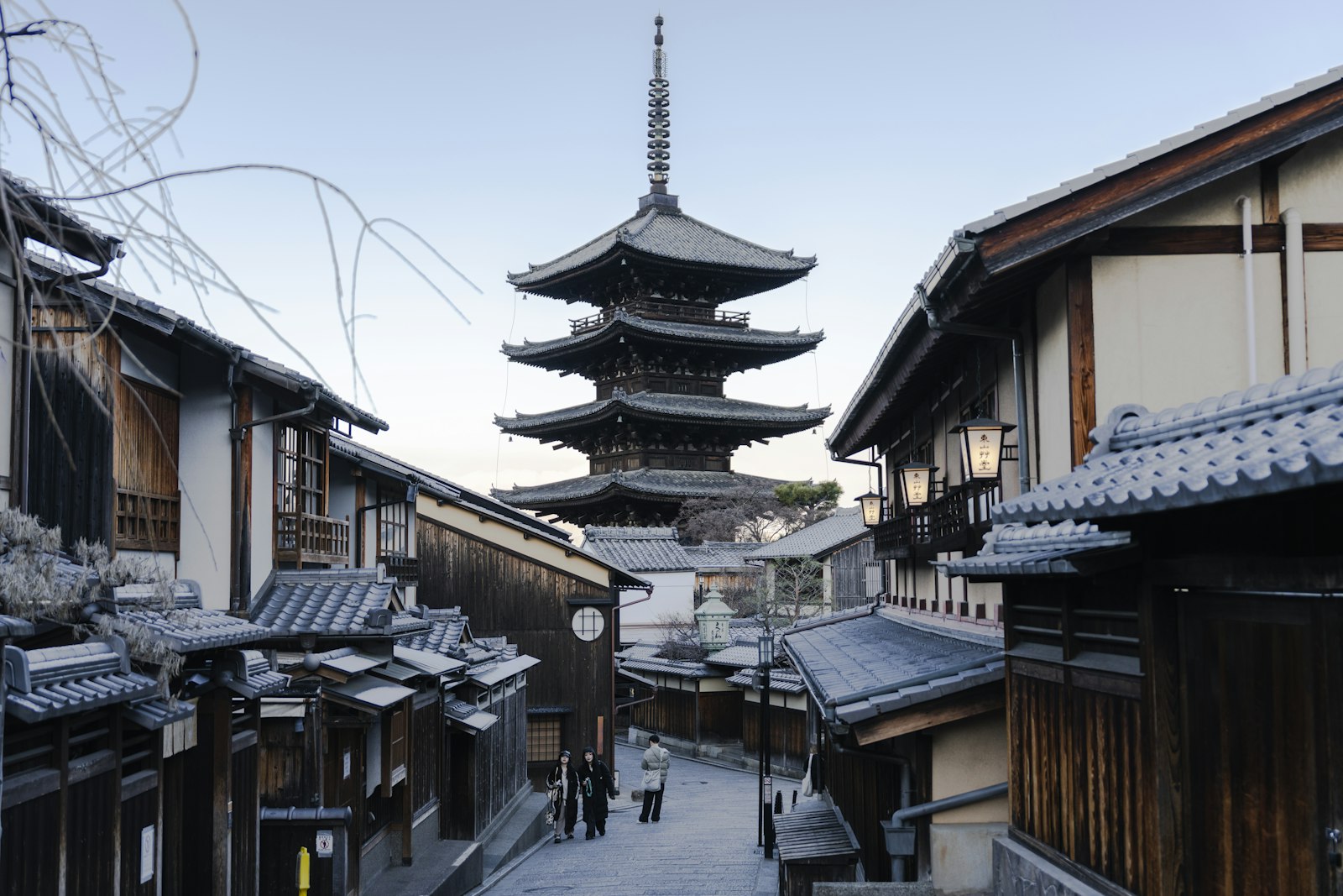 Gion district Kyoto Japan traditional machiya townhouses lanterns evening