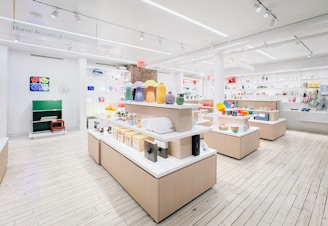 Modern retail store interior with display shelves and products.