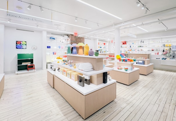 Modern retail store interior with display shelves and products.