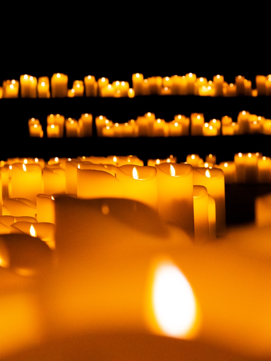 Rows of glowing candles in a traditional service